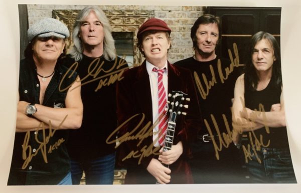 ACDC band signed autographed 8×12 photo photograph Malcolm Young Angus Young Prime Autographs - Top Celebrity Signatures Celebrity Signatures