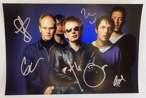 Radiohead band signed autographed 8×12 photo Thom Yorke autographs Prime Autographs - Top Celebrity Signatures Celebrity Signatures