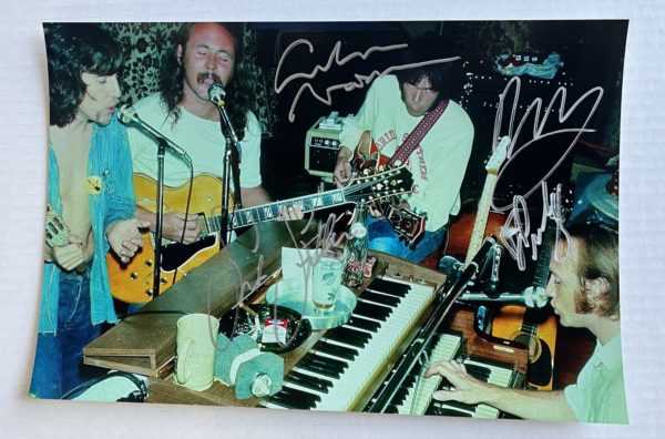 Crosby, Stills, Nash & Young band signed autographed 8×12 photo Neil Young David Crosby autographs Prime Autographs - Top Celebrity Signatures Celebrity Signatures