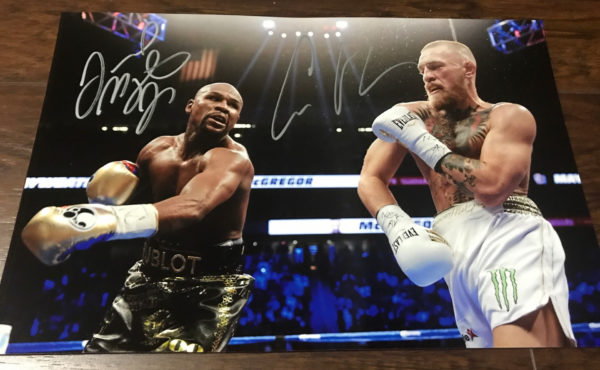 Floyd Mayweather Conor McGregor signed autograph 8×12 photo Prime Autographs - Top Celebrity Signatures Celebrity Signatures