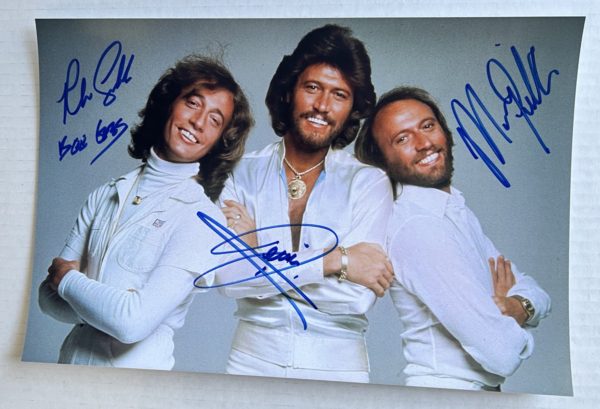 Bee Gees full band signed autographed 8×12 photo Barry Gibb Maurice Robin autographs Prime Autographs - Top Celebrity Signatures Celebrity Signatures